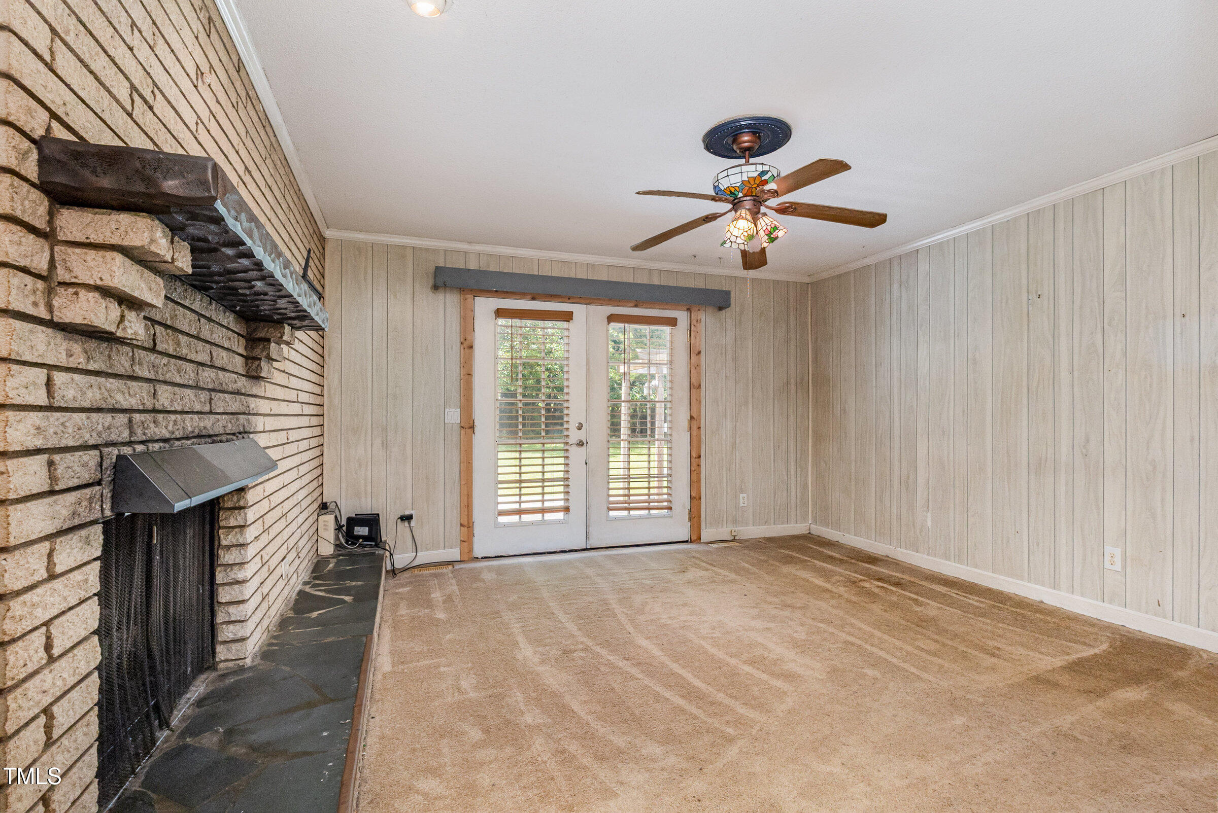 817 Bent Creek Road Bahama, NC 27503 - Photo 15 of 45 a view of a livingroom with a ceiling fan and window