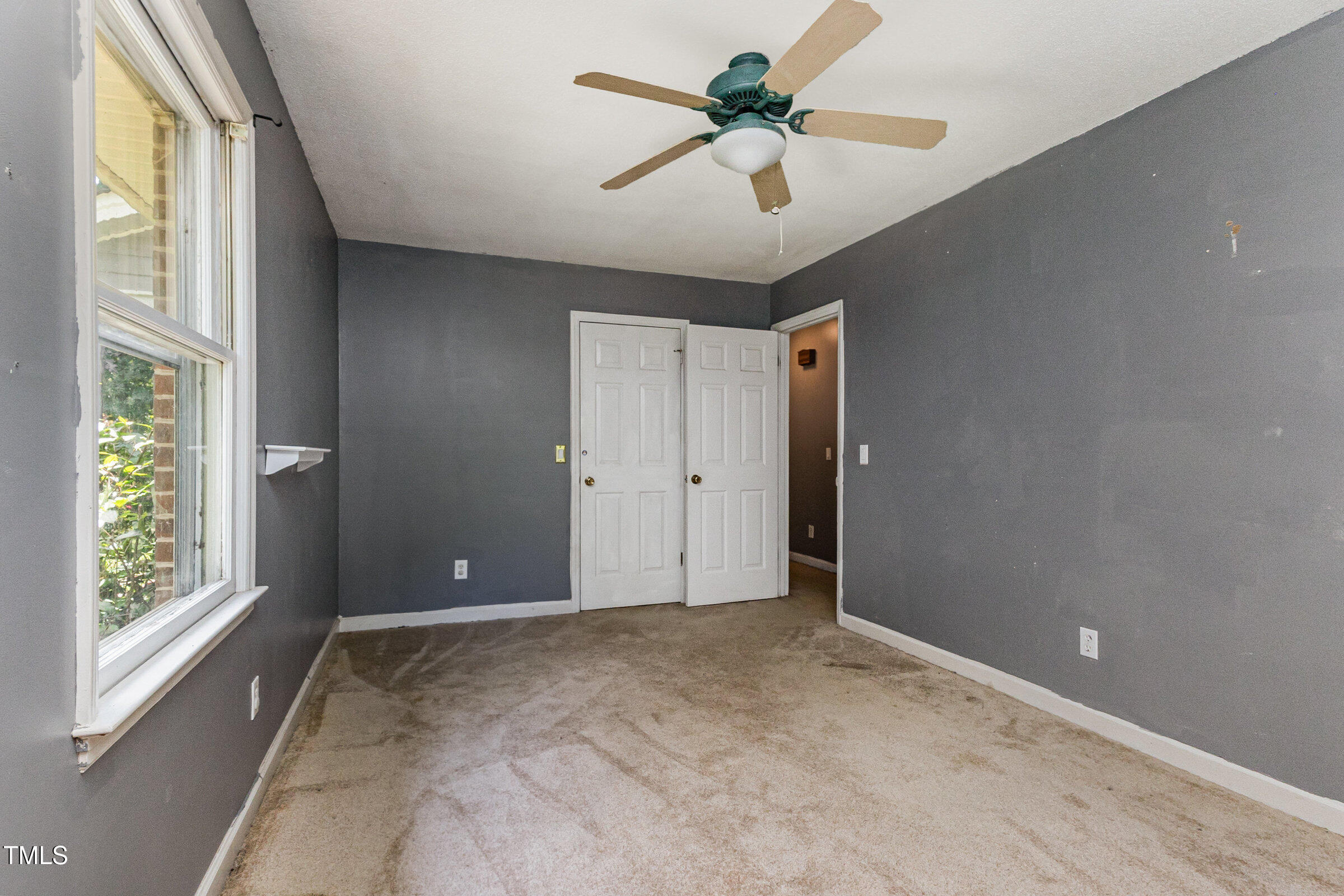 817 Bent Creek Road Bahama, NC 27503 - Photo 21 of 45 a view of an empty room with a window