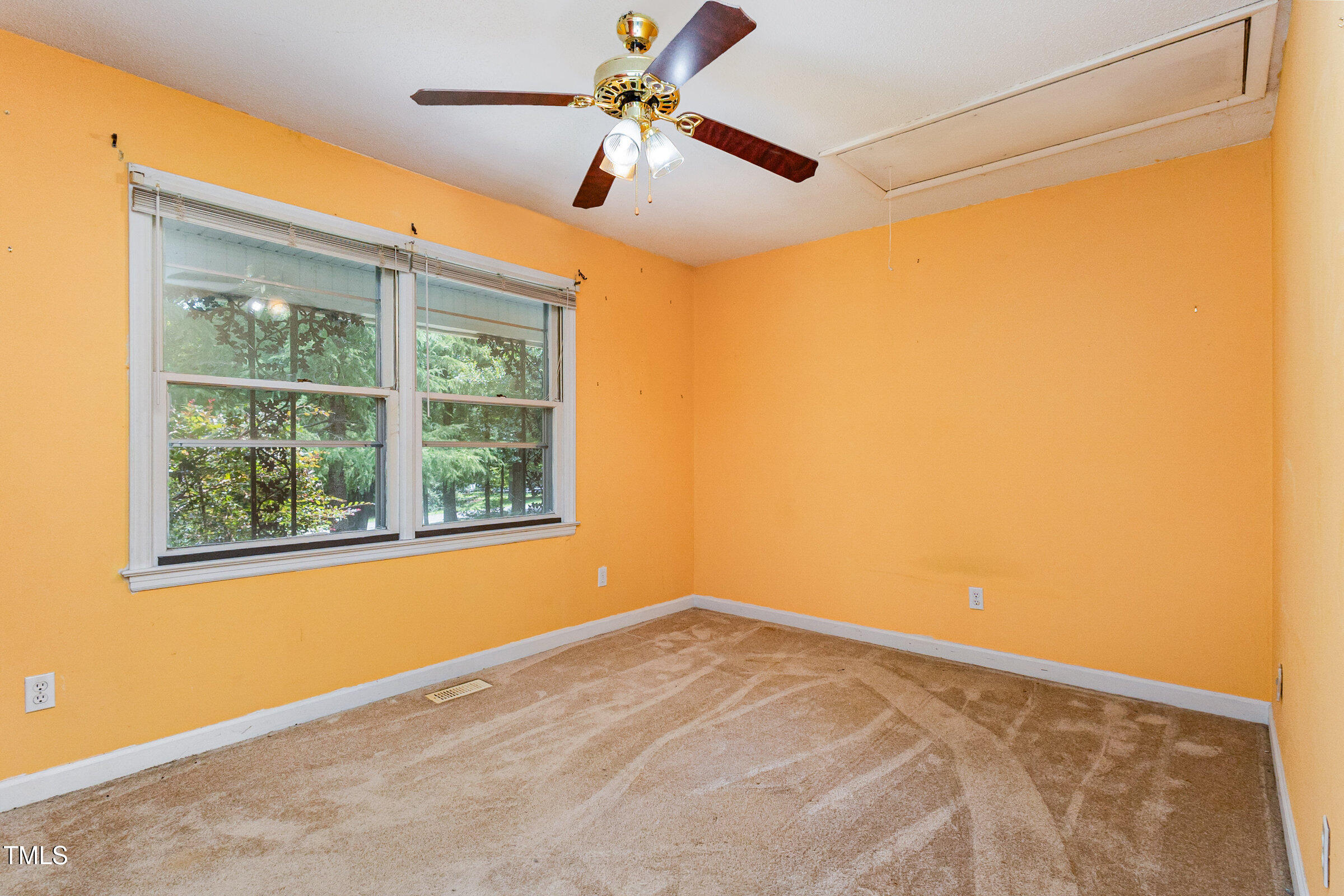 817 Bent Creek Road Bahama, NC 27503 - Photo 22 of 45 a view of an empty room with a window