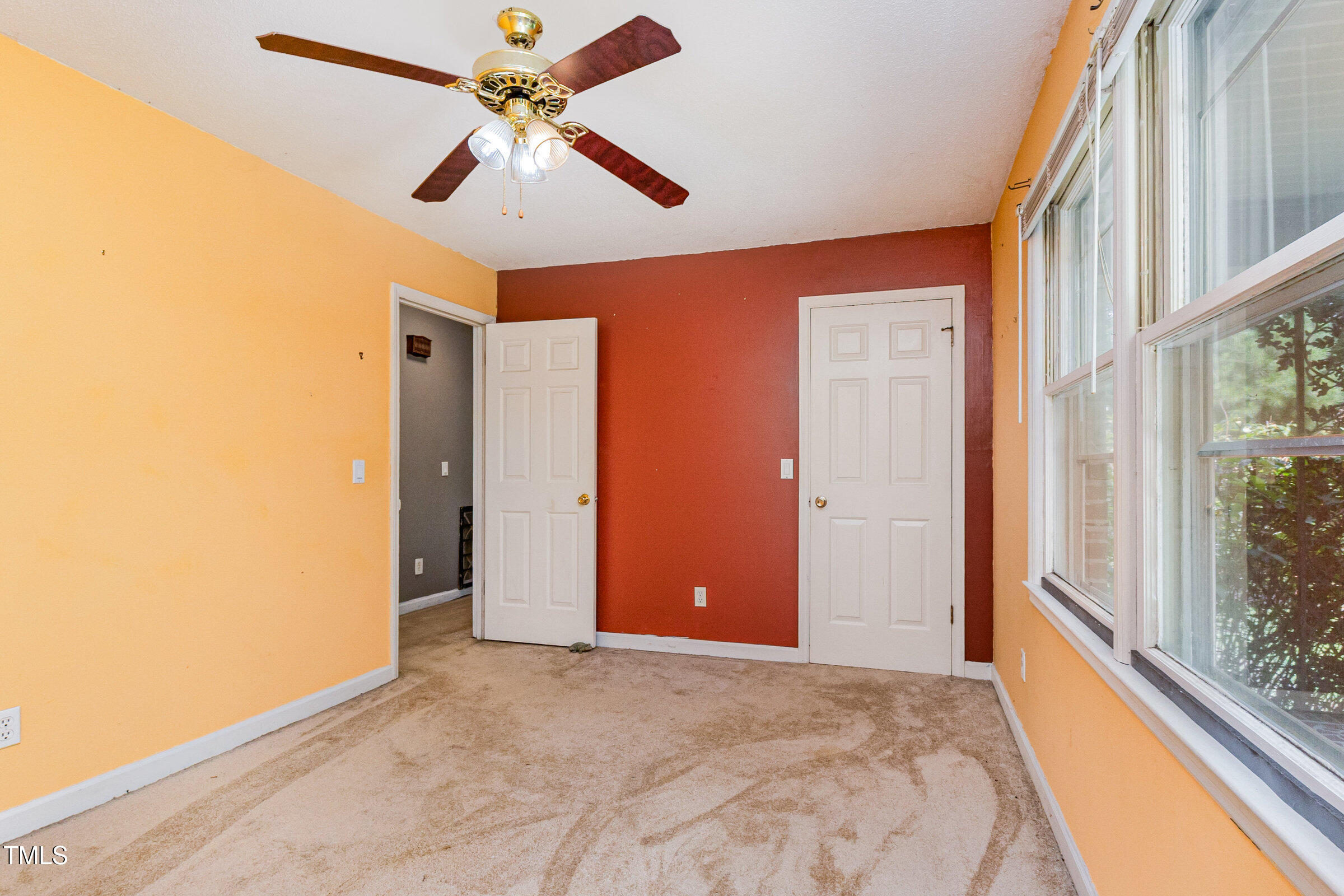 817 Bent Creek Road Bahama, NC 27503 - Photo 23 of 45 a view of a livingroom with a ceiling fan and window