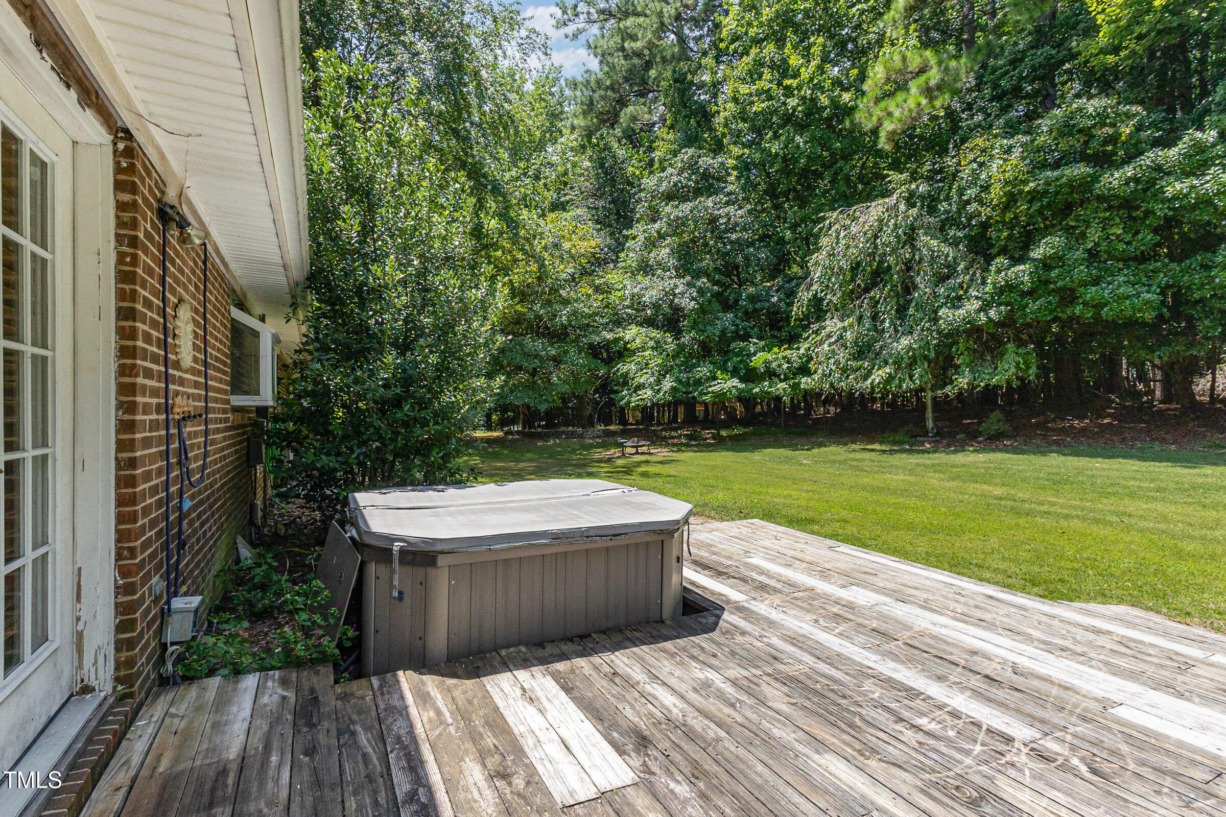 817 Bent Creek Road Bahama, NC 27503 - Photo 26 of 45 a view of a patio with a yard