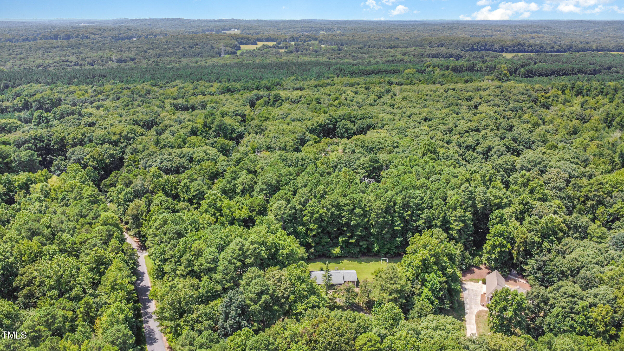 817 Bent Creek Road Bahama, NC 27503 - Photo 38 of 45 an aerial view of mountain with trees