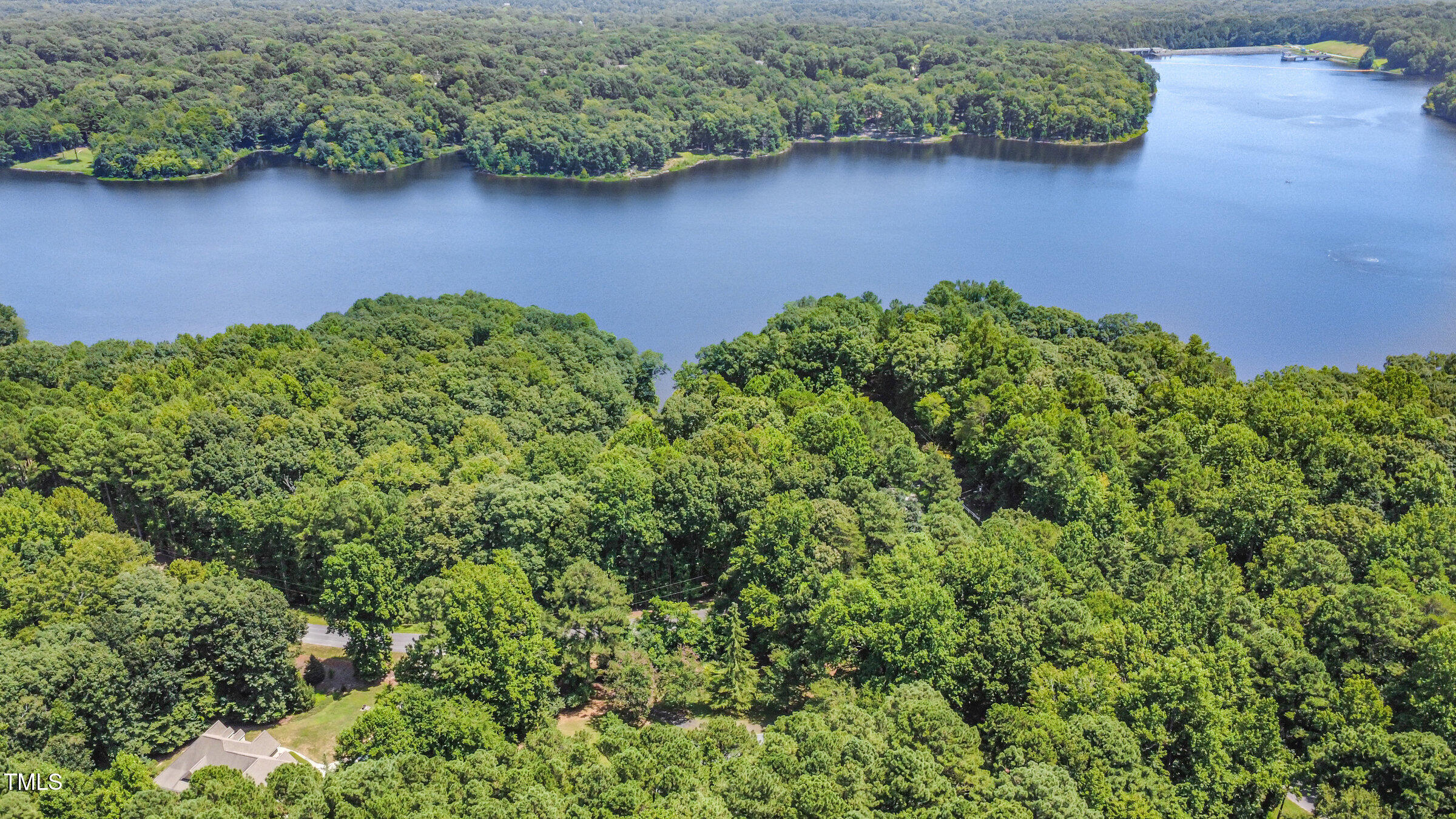 817 Bent Creek Road Bahama, NC 27503 - Photo 40 of 45 an aerial view of a house with a yard and lake view