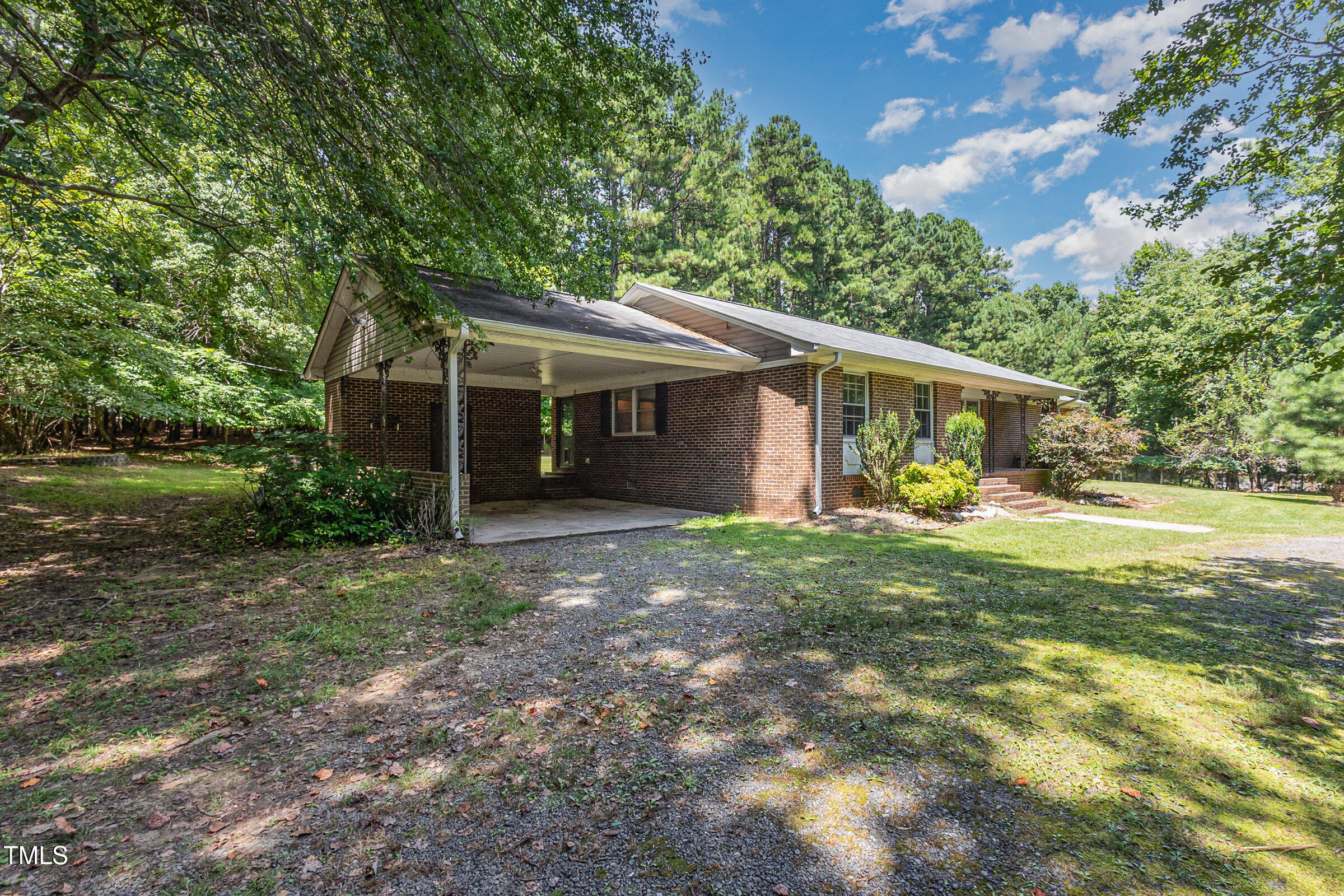 817 Bent Creek Road Bahama, NC 27503 - Photo 4 of 45 a view of a house with yard and sitting area
