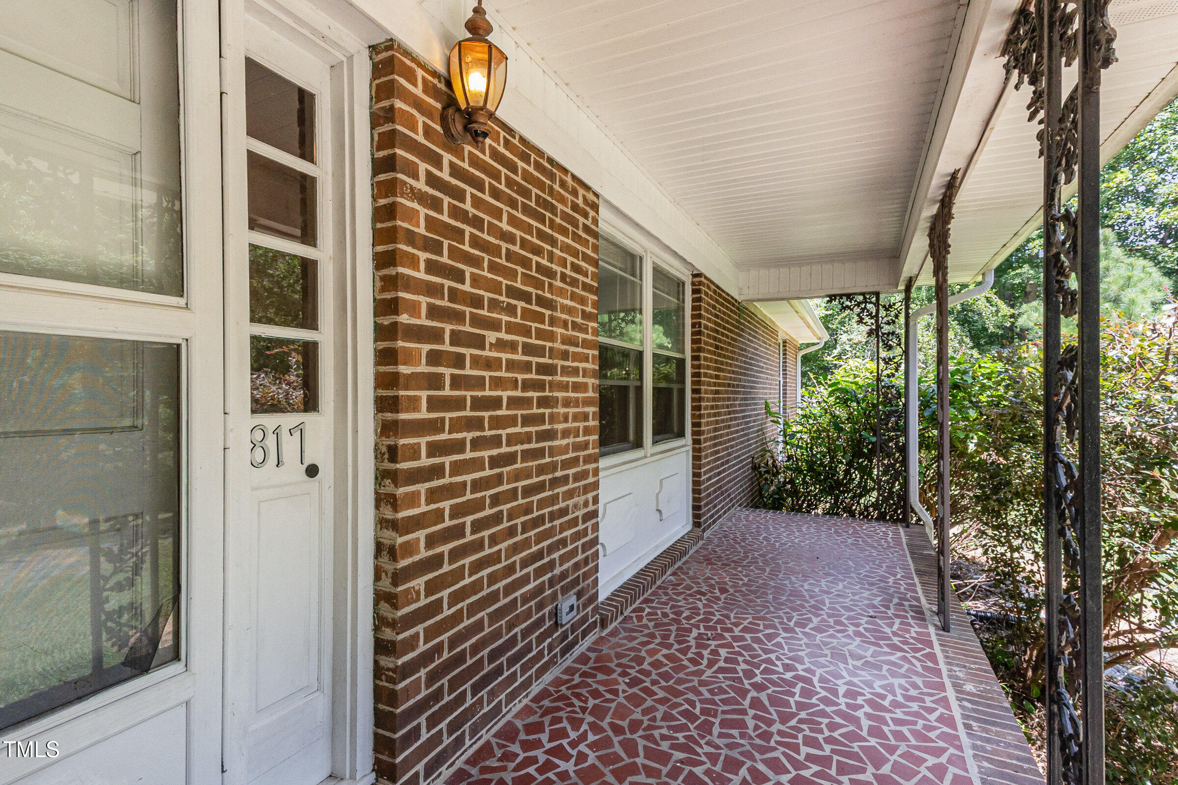 817 Bent Creek Road Bahama, NC 27503 - Photo 5 of 45 a view of a pathway along a building