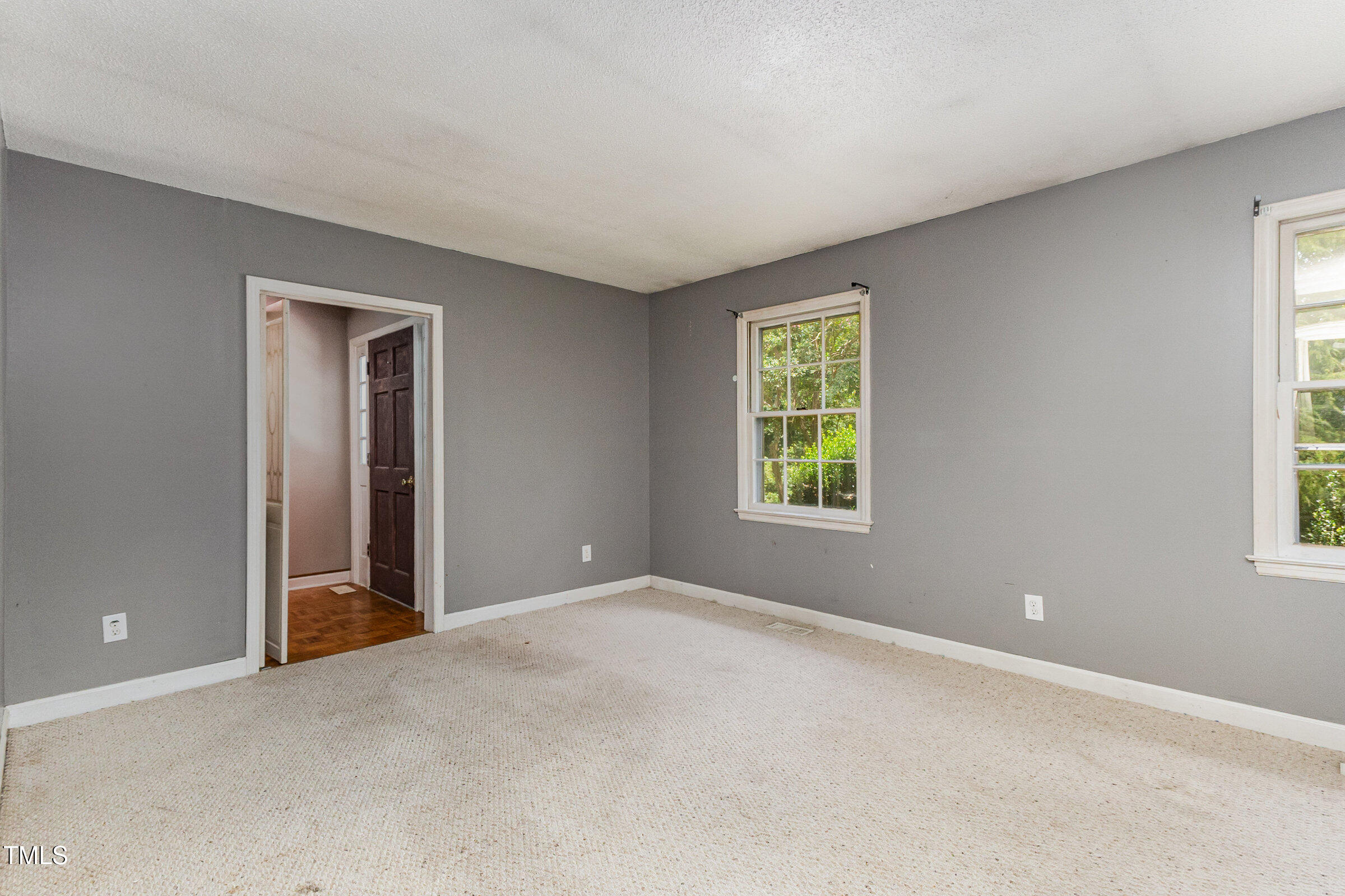 817 Bent Creek Road Bahama, NC 27503 - Photo 8 of 45 a view of an empty room with a window