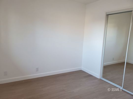 635 West Joyner Avenue Ridgecrest, CA 93555 - Photo 11 of 14 an empty room with a bench