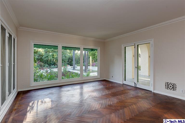 1255 Wentworth Avenue Pasadena, CA 91106 - Photo 21 of 44 a view of a big room with wooden floor and windows