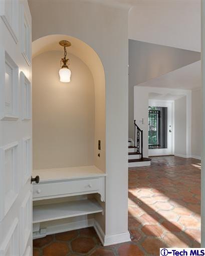 1255 Wentworth Avenue Pasadena, CA 91106 - Photo 23 of 44 a view of an empty room with wooden floor and a cabinet