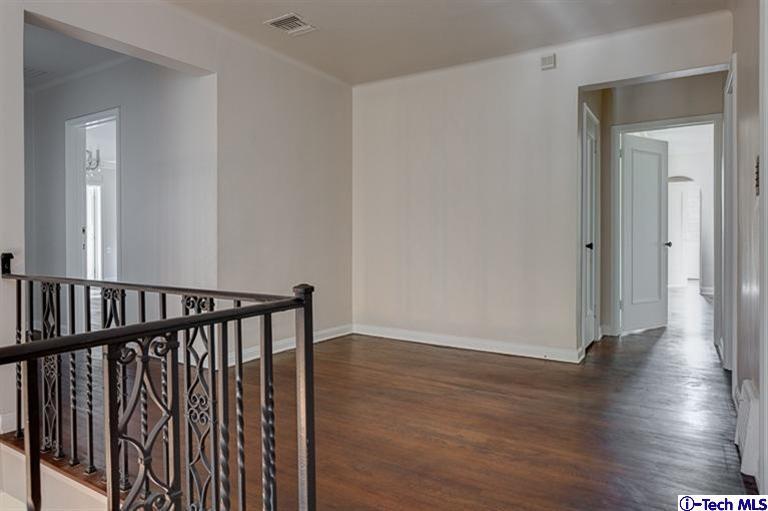 1255 Wentworth Avenue Pasadena, CA 91106 - Photo 25 of 44 a view of a hallway with wooden floor