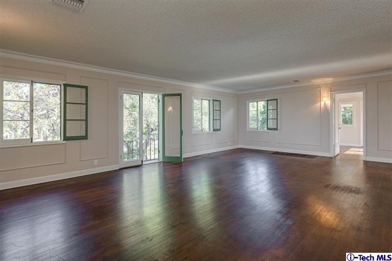 1255 Wentworth Avenue Pasadena, CA 91106 - Photo 26 of 44 a view of an empty room with wooden floor and a window