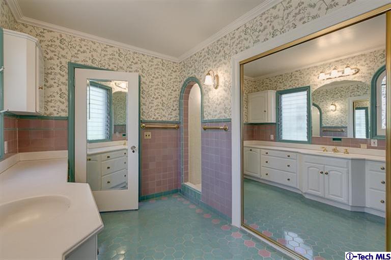 1255 Wentworth Avenue Pasadena, CA 91106 - Photo 27 of 44 a spacious bathroom with a granite countertop sink mirror and bathtub