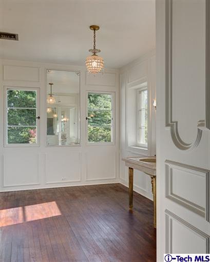 1255 Wentworth Avenue Pasadena, CA 91106 - Photo 33 of 44 a view of an empty room with wooden floor and a window