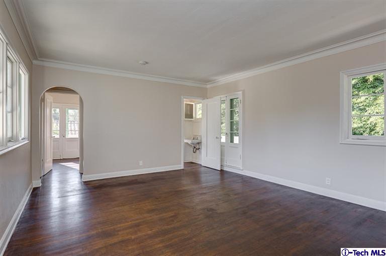 1255 Wentworth Avenue Pasadena, CA 91106 - Photo 36 of 44 an empty room with wooden floor and windows
