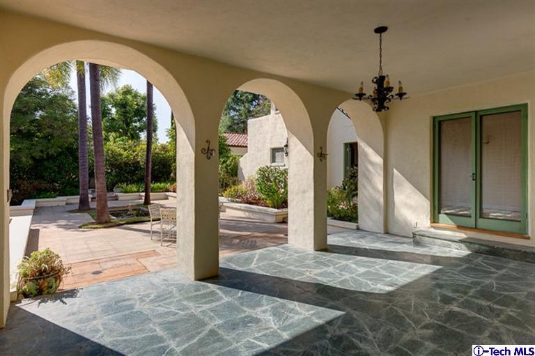 1255 Wentworth Avenue Pasadena, CA 91106 - Photo 41 of 44 a view of a hall with a floor to ceiling windows and a rug