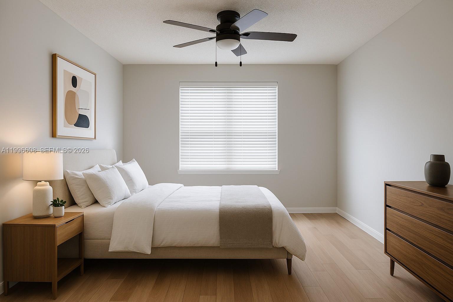 8050 North Nob Hill Road, Unit 203 Tamarac, FL 33321 - Photo 3 of 9 a bedroom with a bed and a window