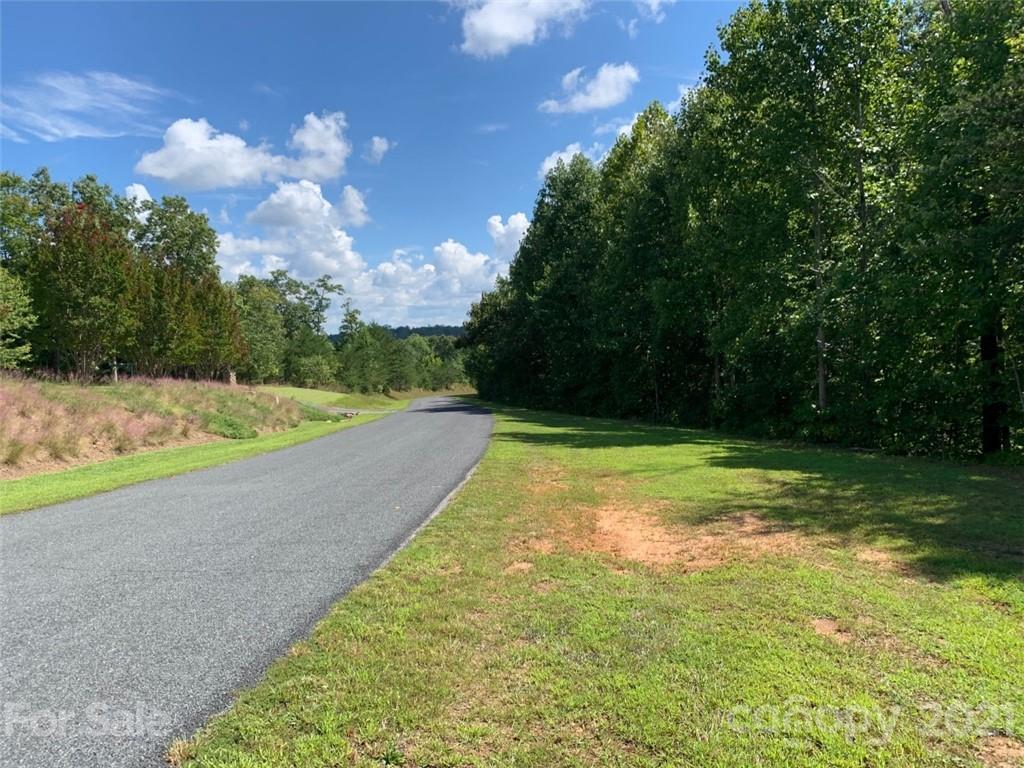 999 Silver Ridge Road, Unit 30 & 31 Mill Spring, NC 28756 - Photo 1 of 8 a view of a yard