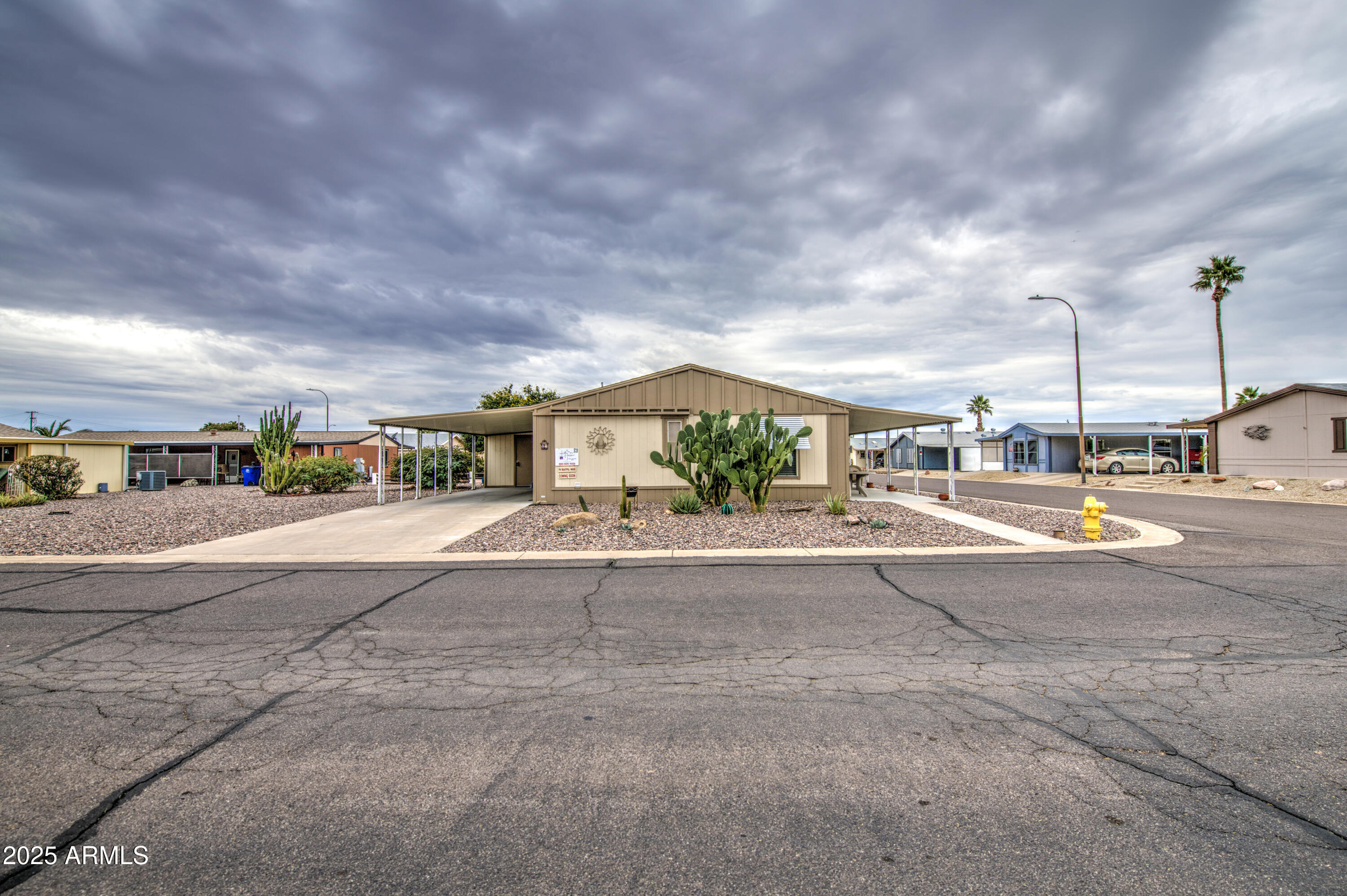 2208 West Baseline Avenue, Unit 67 Apache Junction, AZ 85120 - Photo 13 of 41 a view of street with cars