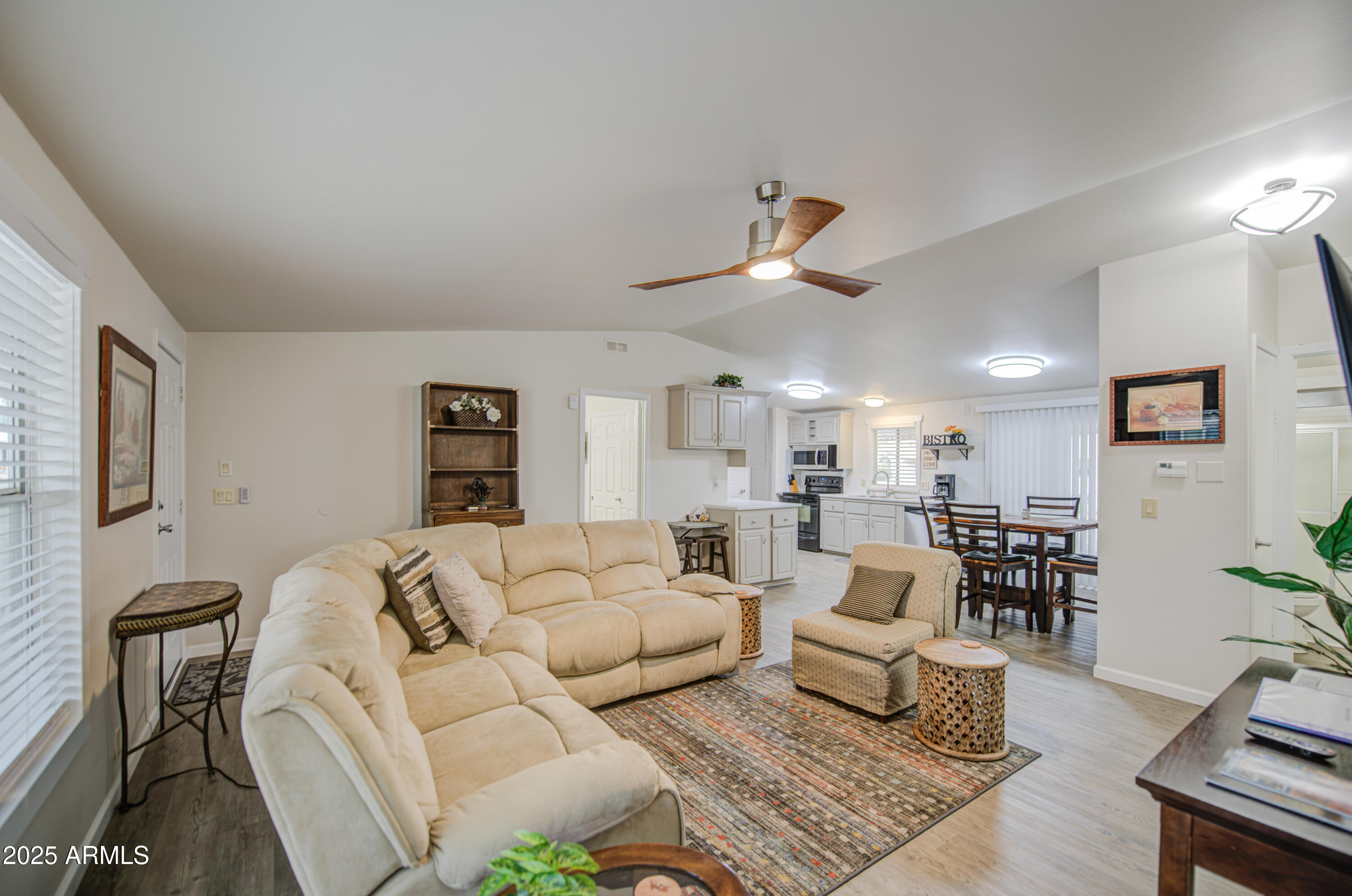 2208 West Baseline Avenue, Unit 67 Apache Junction, AZ 85120 - Photo 28 of 41 a living room with furniture