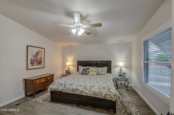 a bathroom with a shower curtain and a sink