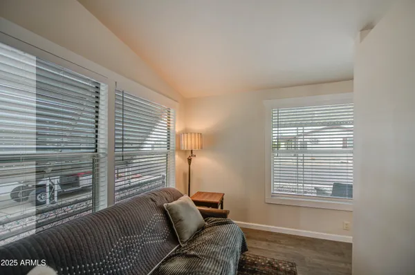 a bathroom with a sink a vanity and a mirror