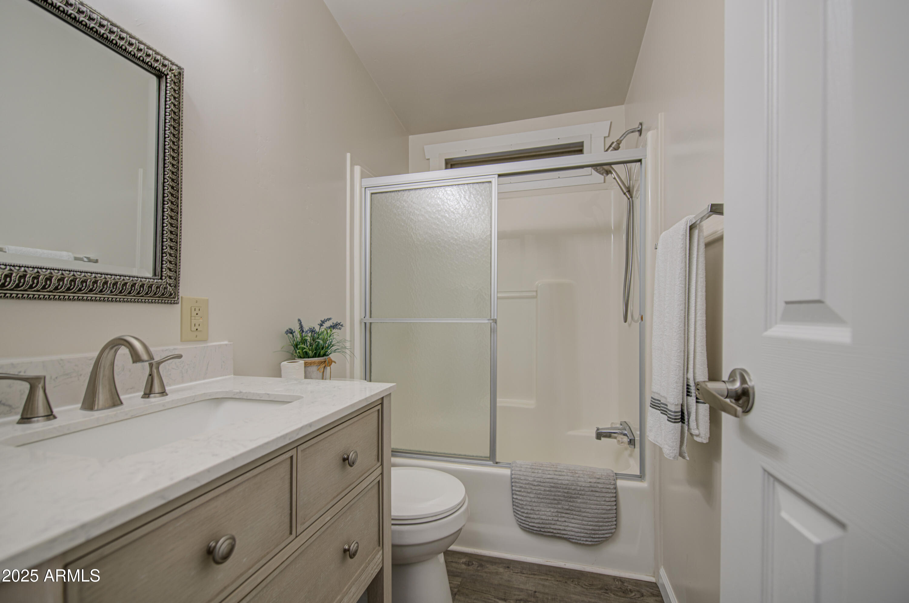2208 West Baseline Avenue, Unit 67 Apache Junction, AZ 85120 - Photo 7 of 41 a bathroom with a sink toilet and shower