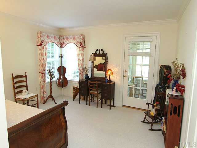 511 Mason Road Durham, NC 27712 - Photo 11 of 25 a view of a livingroom with furniture and a window