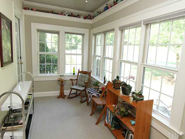 511 Mason Road Durham, NC 27712 - Photo 12 of 25 a living room with furniture and floor to ceiling windows