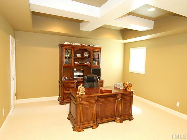 511 Mason Road Durham, NC 27712 - Photo 14 of 25 a room with a desk and chair