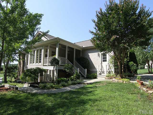 511 Mason Road Durham, NC 27712 - Photo 20 of 25 a view of house with a yard