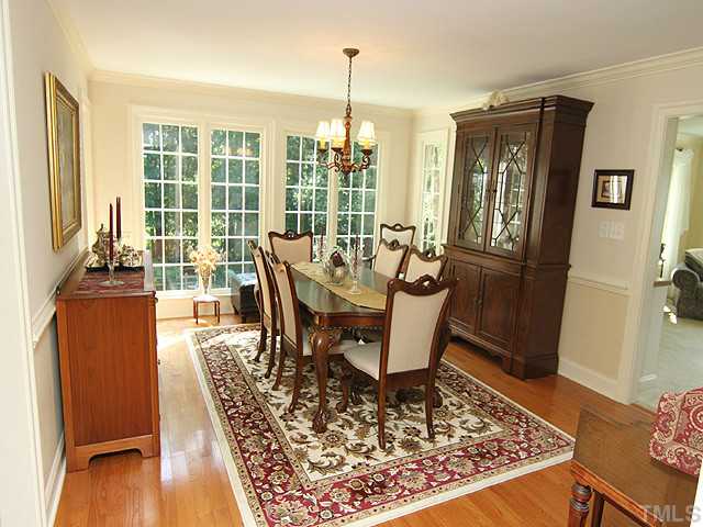 511 Mason Road Durham, NC 27712 - Photo 5 of 25 a view of a dining room with furniture window and wooden floor