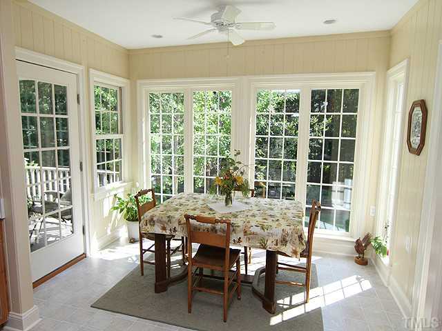 511 Mason Road Durham, NC 27712 - Photo 8 of 25 a view of a dining room with furniture window and outside view