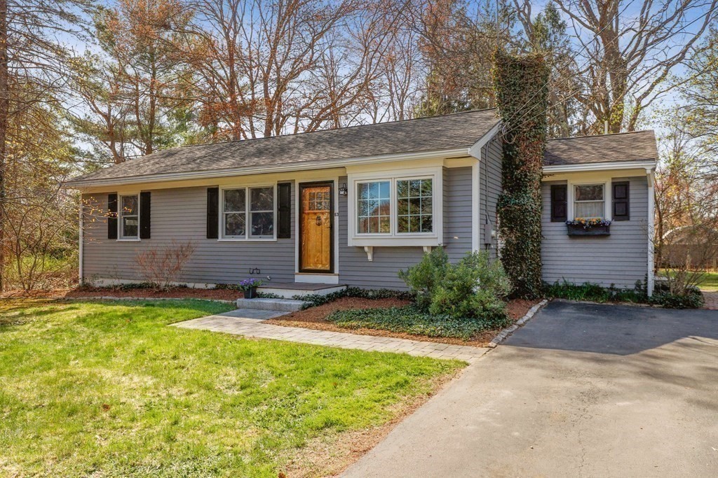63 Conant Street Acton, MA 01720 - Photo 19 of 30 a view of a house with backyard and sitting area