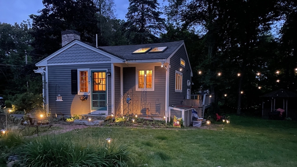63 Conant Street Acton, MA 01720 - Photo 29 of 30 a front view of a house with a garden