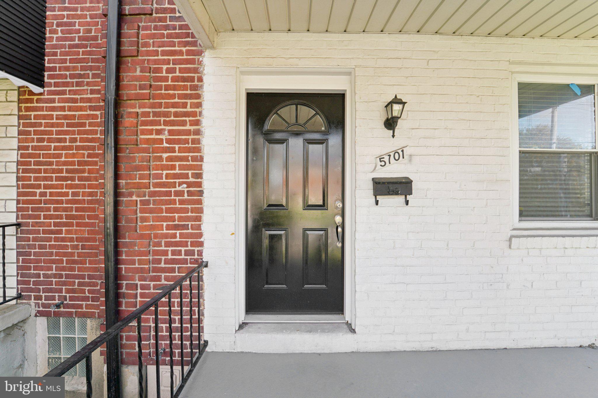 5701 The Alameda Baltimore, MD 21239 - Photo 5 of 29 a front view of a house with a shower