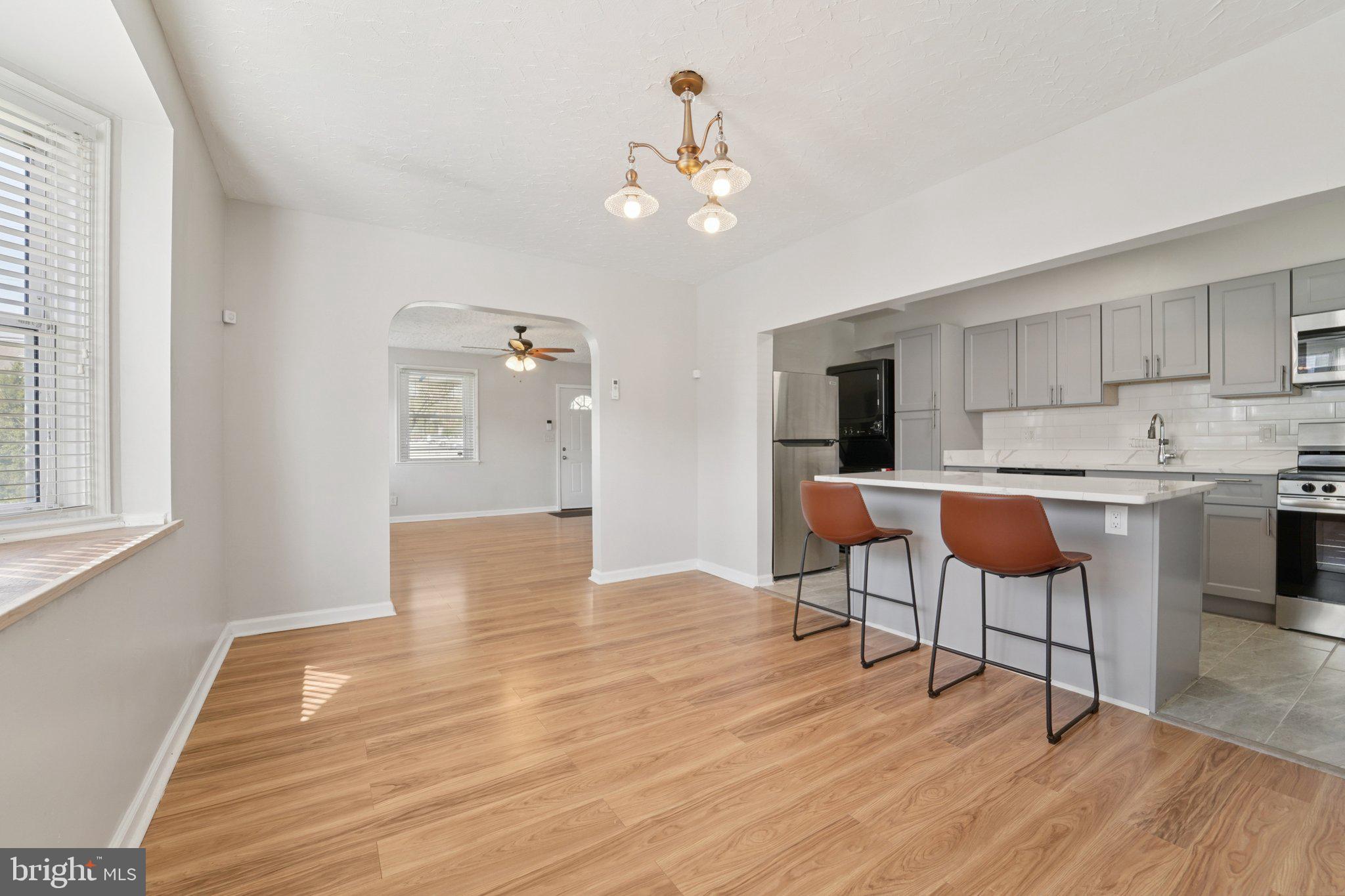 5701 The Alameda Baltimore, MD 21239 - Photo 9 of 29 a view of a kitchen with cabinets and wooden floor