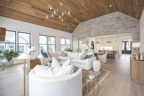 a bathroom with a shower sink and mirror