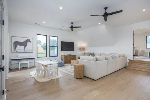 a bedroom with bed and a table