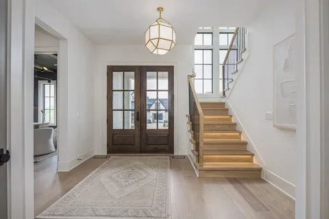 a bathroom with a double vanity sink a tub and shower