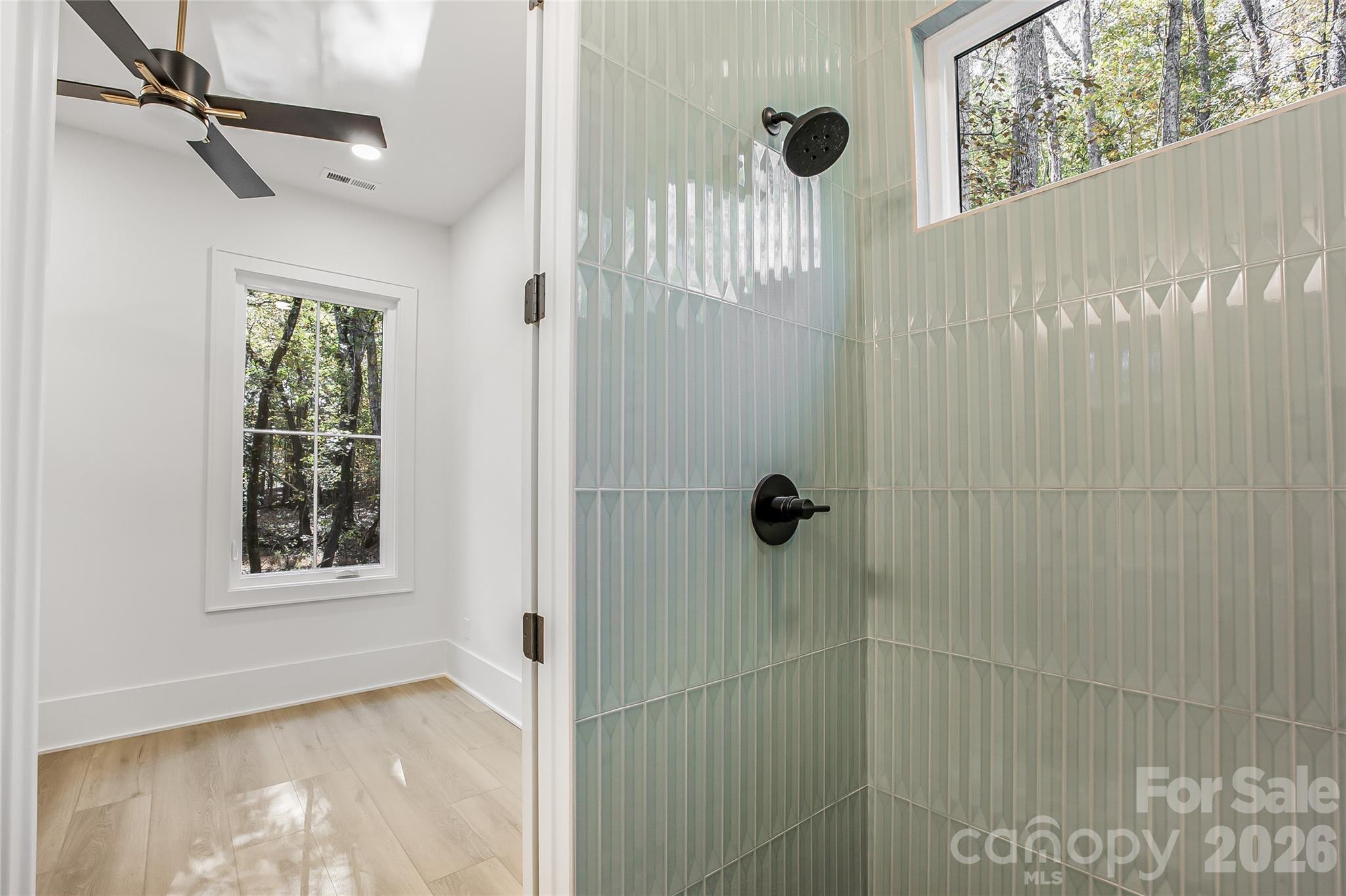 4221 Spring Street Charlotte, NC 28270 - Photo 15 of 44 a view of a bathroom with a window