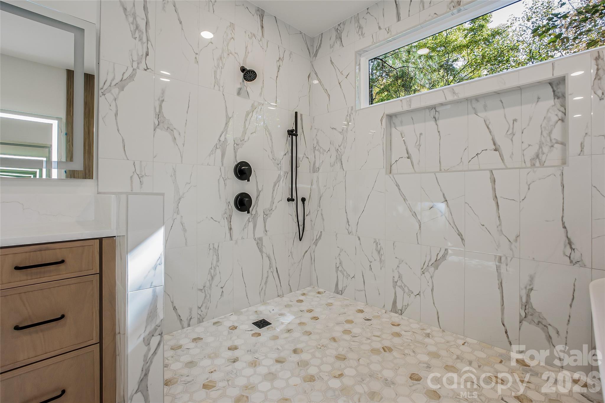 4221 Spring Street Charlotte, NC 28270 - Photo 23 of 44 a bathroom with a shower