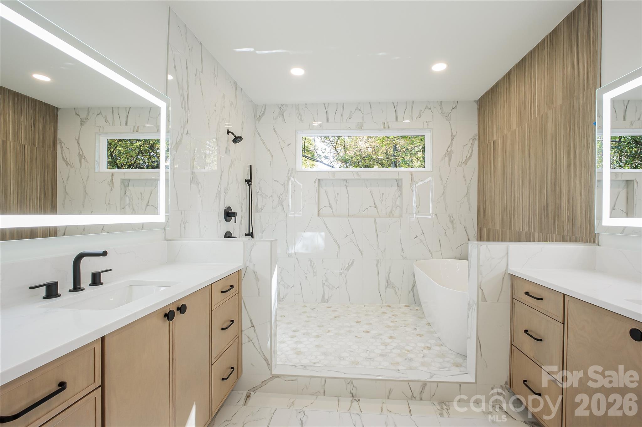 4221 Spring Street Charlotte, NC 28270 - Photo 24 of 44 a bathroom with a sink a toilet and shower