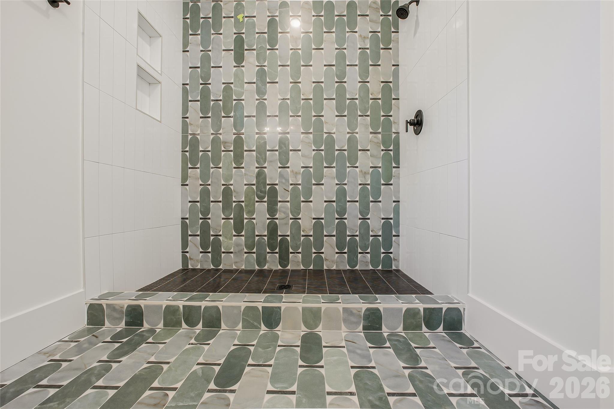 4221 Spring Street Charlotte, NC 28270 - Photo 28 of 44 a bathroom with a shower