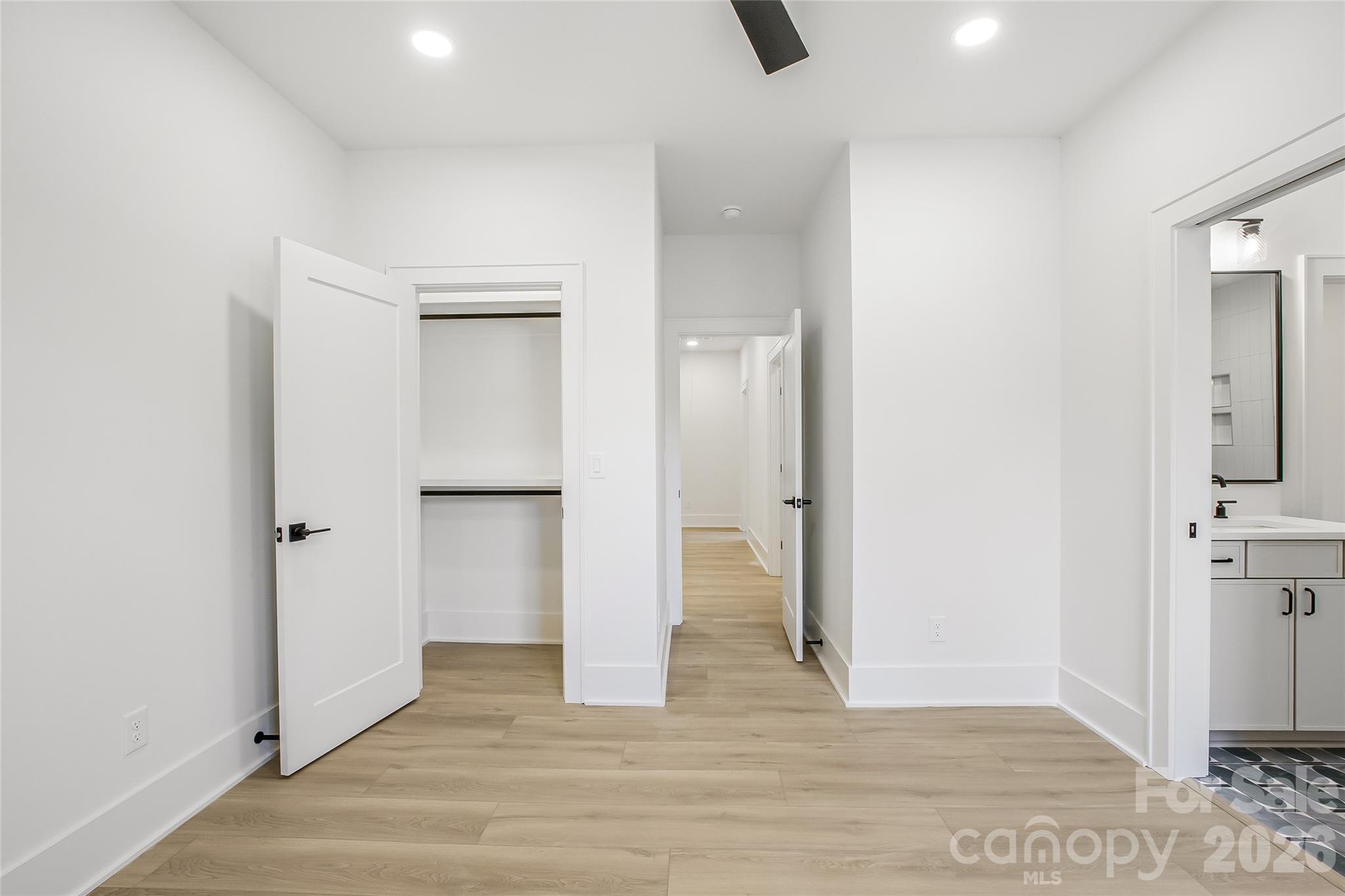4221 Spring Street Charlotte, NC 28270 - Photo 32 of 44 a view of empty room with wooden floor