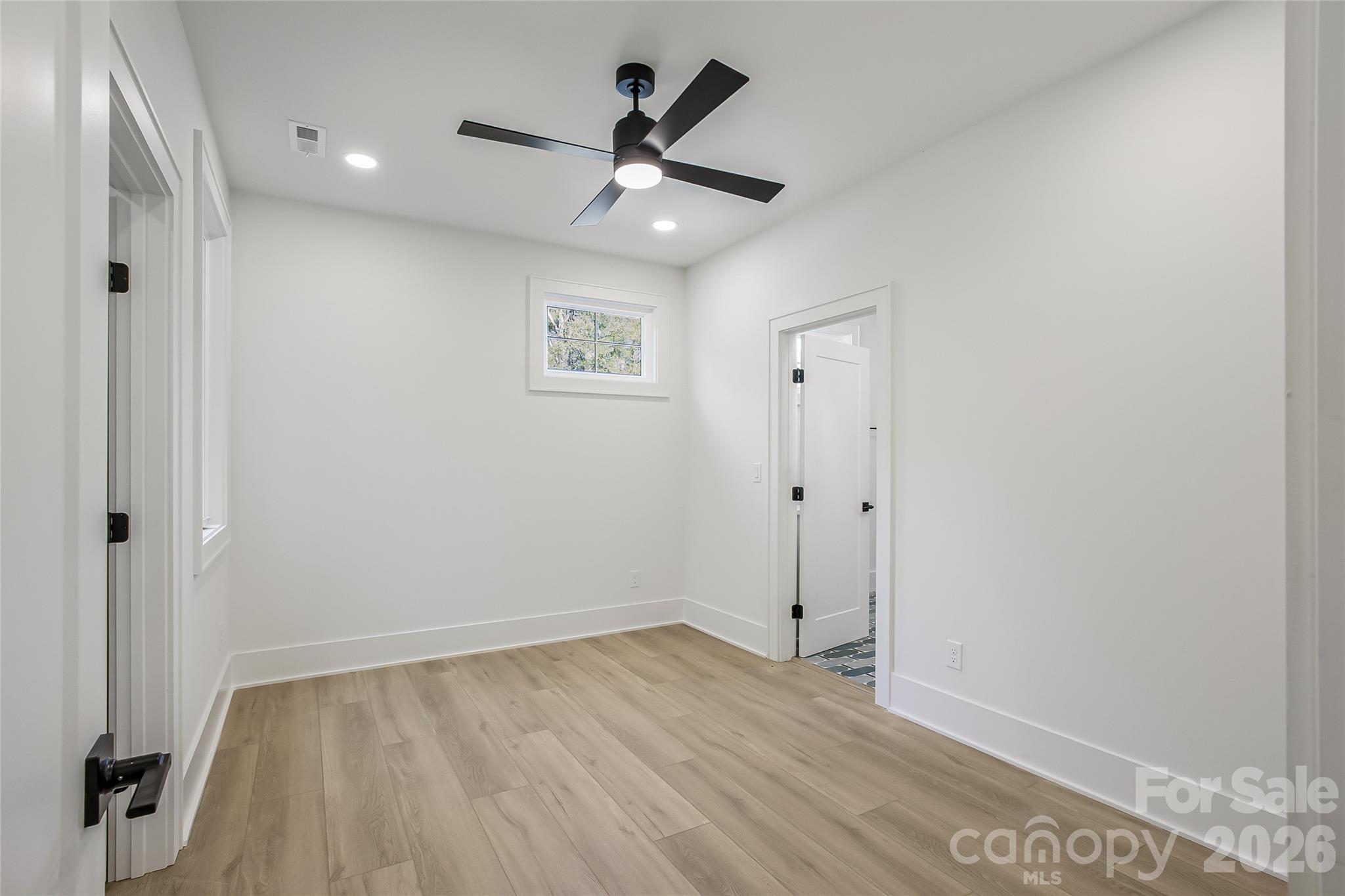 4221 Spring Street Charlotte, NC 28270 - Photo 36 of 44 wooden floor in an empty room