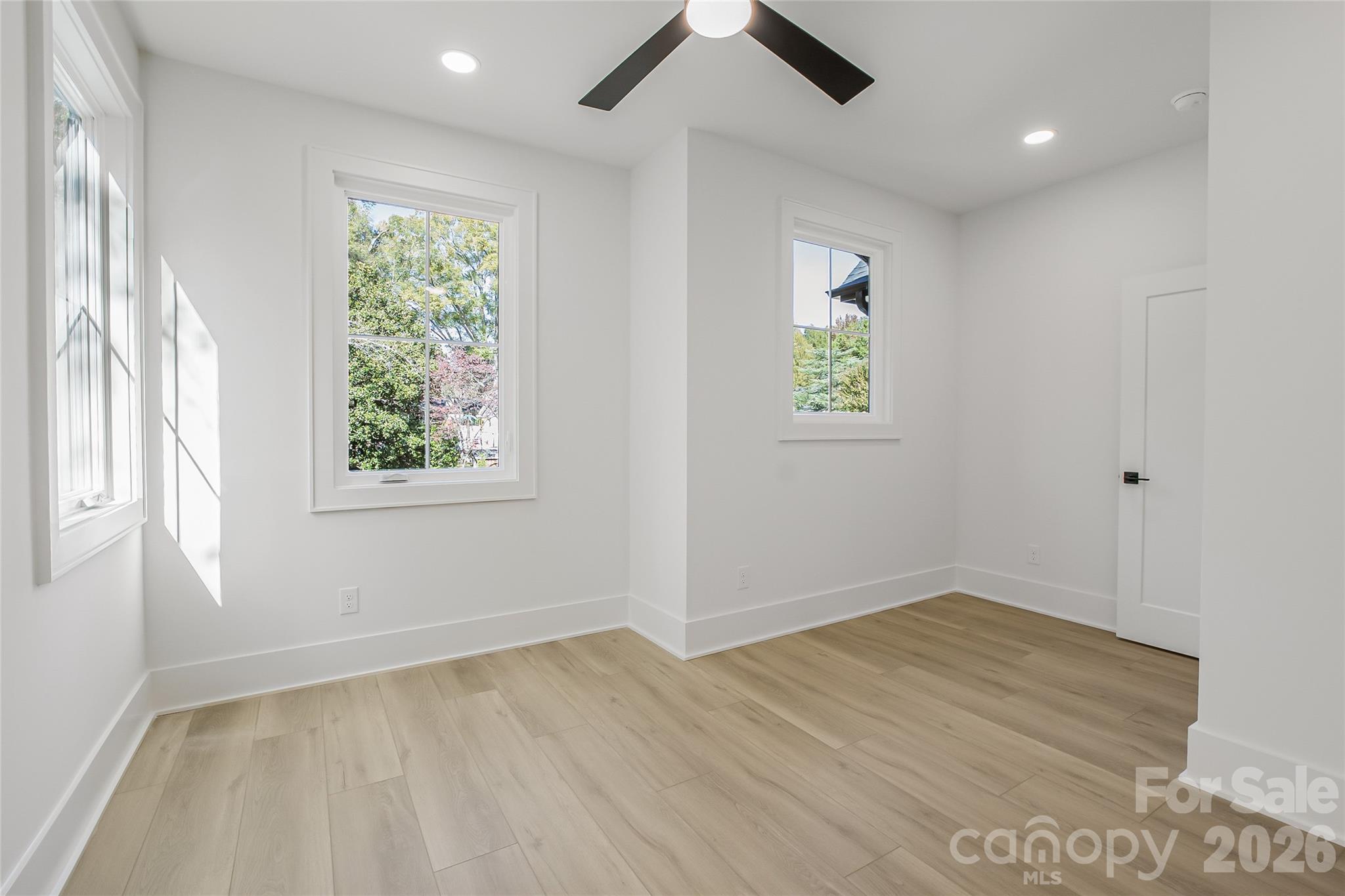 4221 Spring Street Charlotte, NC 28270 - Photo 42 of 44 an empty room with windows