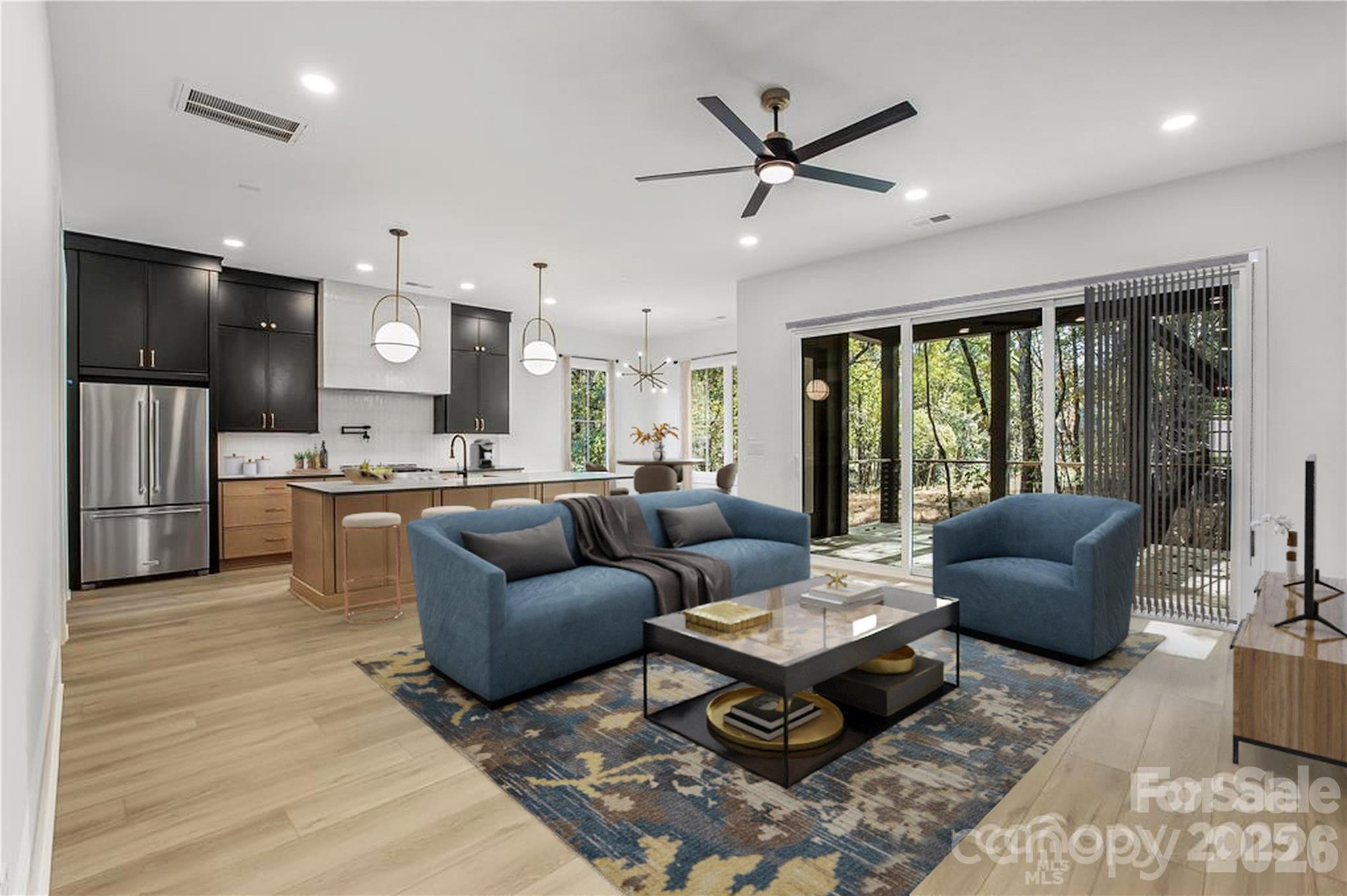 4221 Spring Street Charlotte, NC 28270 - Photo 5 of 44 a living room with furniture and a flat screen tv