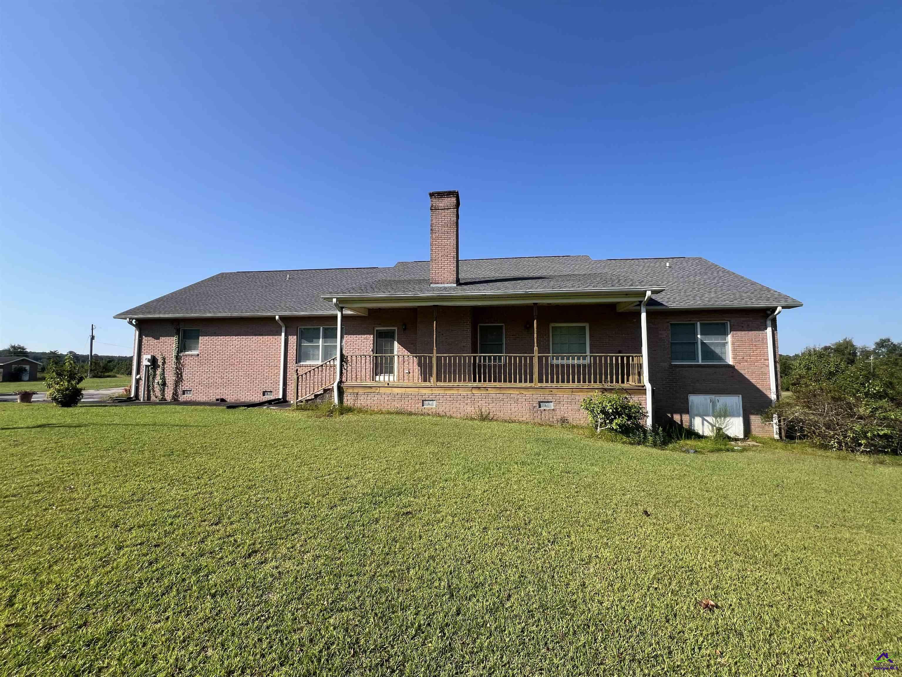 762 Nicholson-Carr Road Chester, GA 31012 - Photo 2 of 81 a front view of a house with a garden