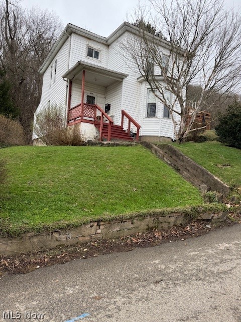 626 High Street Wellsburg, WV 26070 - Photo 2 of 18 View of front of home with a front lawn