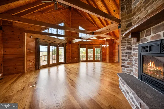 a kitchen with stainless steel appliances a stove a sink and a refrigerator